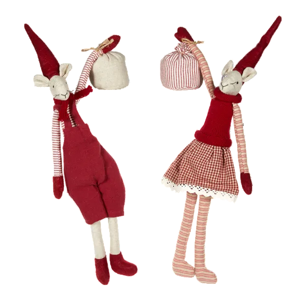 Two handmade fabric animal dolls on a plain white background. One doll is shaped like a sheep in red overalls with striped sleeves and a red hat, holding a cream sack.
