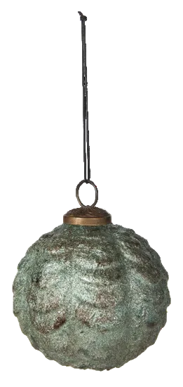 A textured, spherical hanging ornament with a distressed, metallic green and bronze patina finish, suspended by a thin black string against a plain white background.