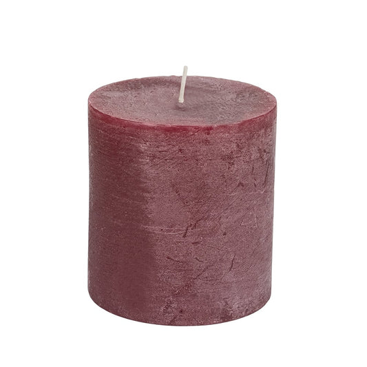 Purple candle on a white background