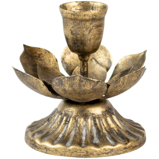 Nordic-inspired lotus flower candleholder styled on a natural linen table.