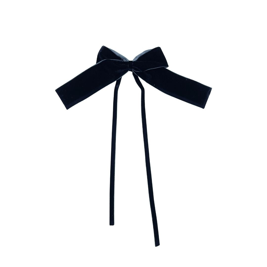 Black velvet bow on a white background