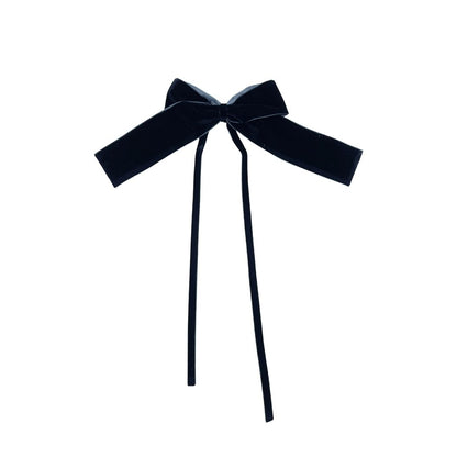 Black velvet bow on a white background