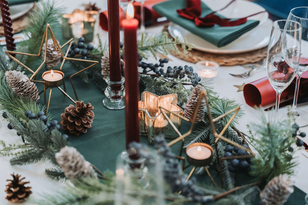 Scandinavian-inspired winter tablescape featuring soft foliage and velvet details by Noble & Nordic.